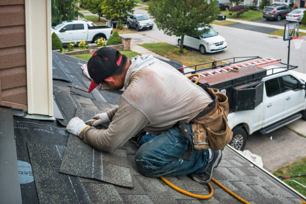 Professional Roofing technician working in Oak City, UT